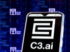 A smartphone with the C3ai logo on the screen