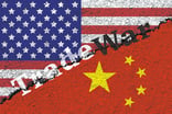 US-China trade war depiced as two halves of a flag with a crack down the middle.