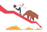 Panic selling as man in tie follows a bear down a red arrow