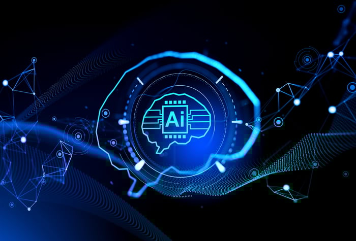 Outline of a human brain with a semiconductor labeled "AI" inside -- concept for AI. 