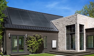 tesla solar panels on roof of building