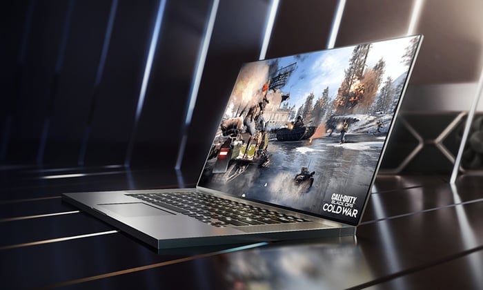 A laptop with an Nvidia graphics card and a game on screen.