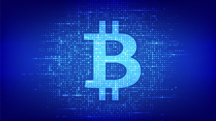 Bitcoin logo in blue.
