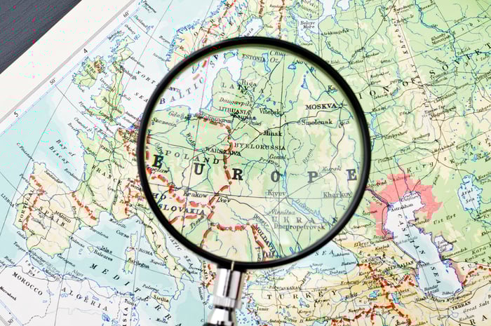 Map of Europe under a magnifying glass.