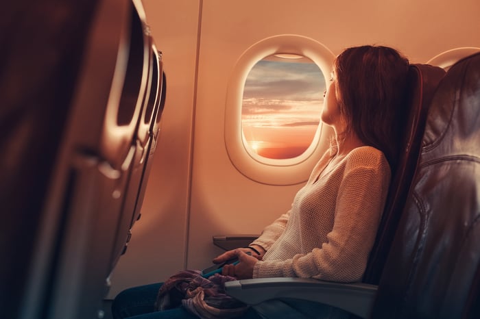 A passenger in an airplane.