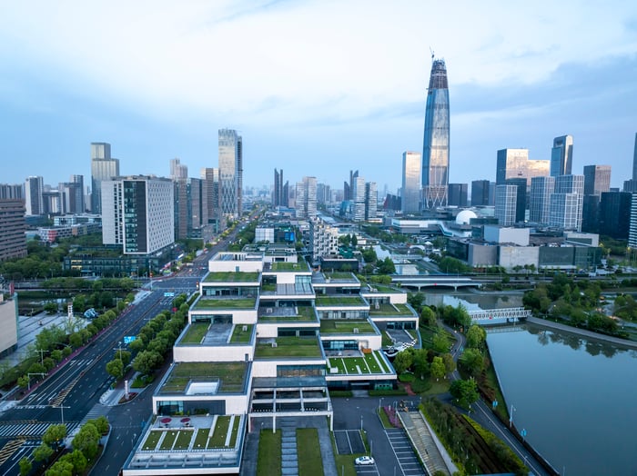 A city with various large commercial buildings.
