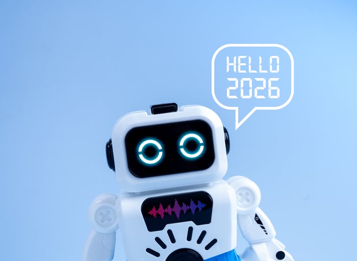 A white robot that says "Hello 2026" in a bubble