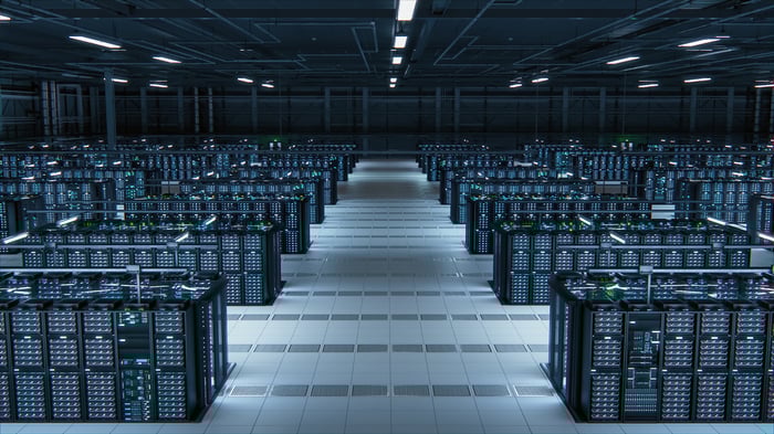 A data center with rows of server racks.
