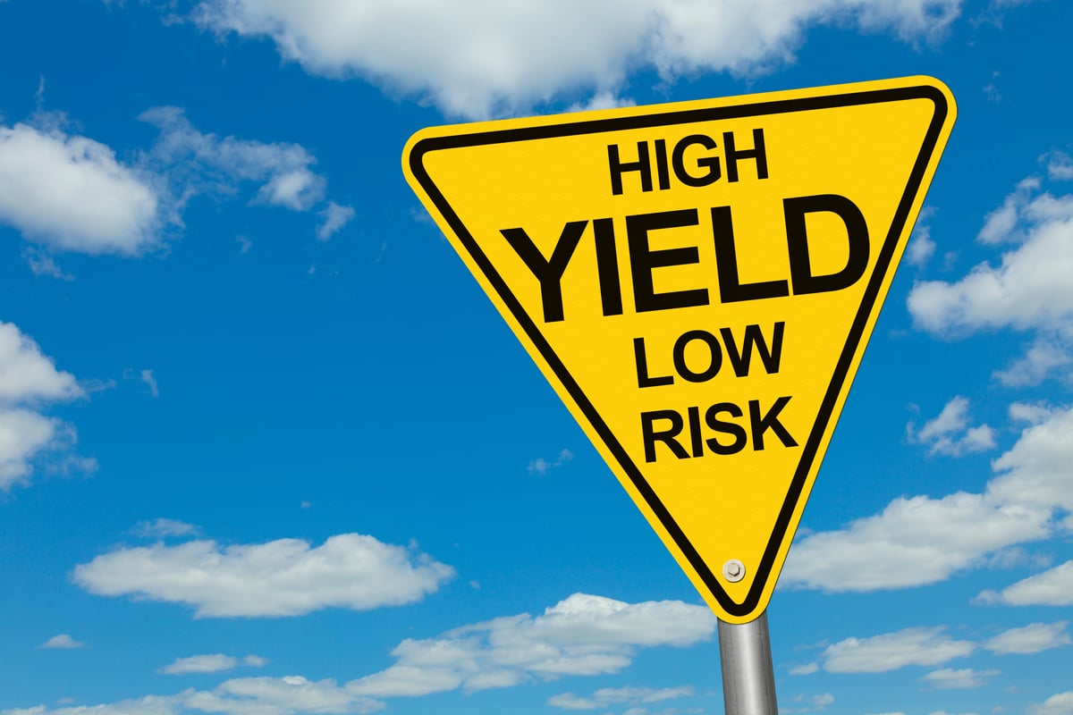 24_07_03 A triangular yellow sign that says high yield low risk on it _MF Dload GettyImages-188027740-1200x800-5b2df79