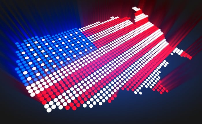 Map of the U.S. made entirely of red, white, and blue lights meant to represent the American flag. 