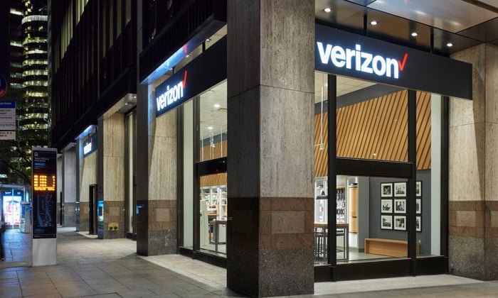 A Verizon store exterior with the Verizon logo on the side.
