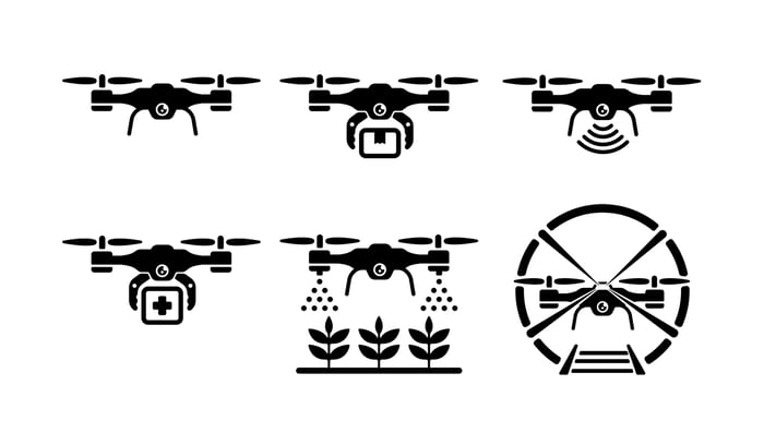 Drone silhouettes on a white background.