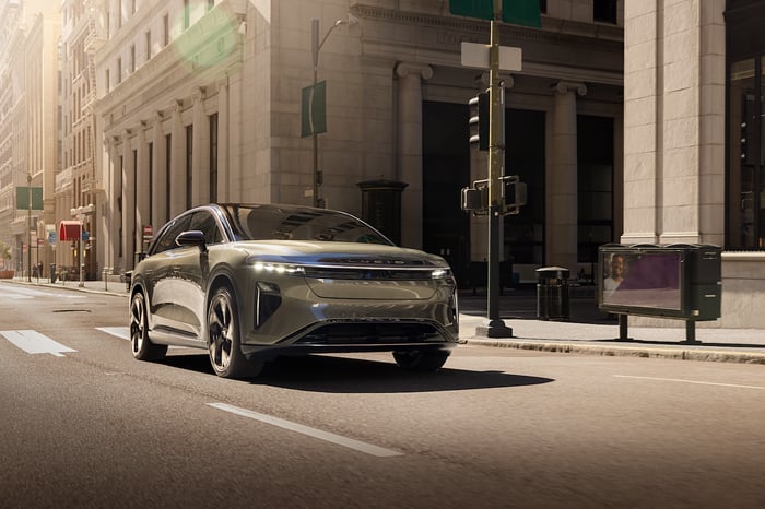 A Lucid SUV in the city.