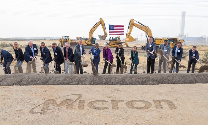 A team from Micron Technology breaks ground on a construction project.