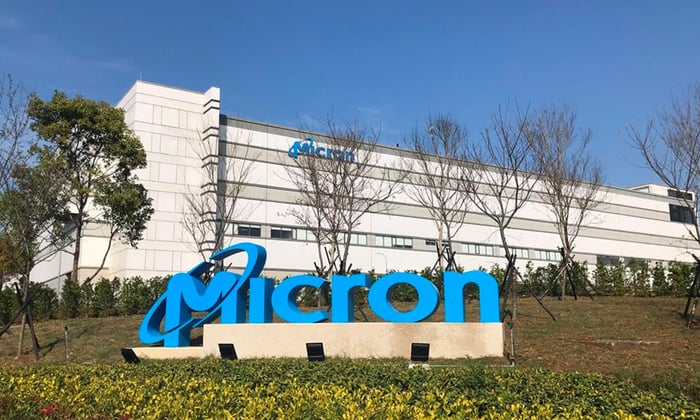 A bright blue Micron logo in front of the company's headquarters in Boise, Idaho.
