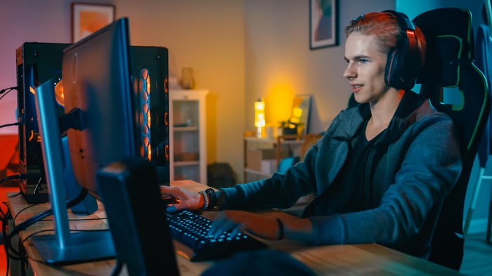 Gamer playing on his computer.