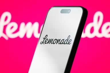 lemonade logo on smartphone with bright pink background-LMND