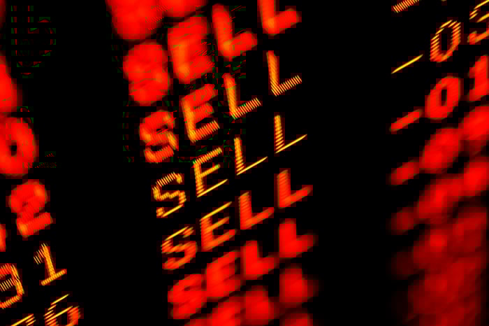 A list of red "sell" emblems on a ticker list.