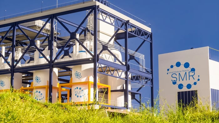 An SMR power plant against a blue sky. 