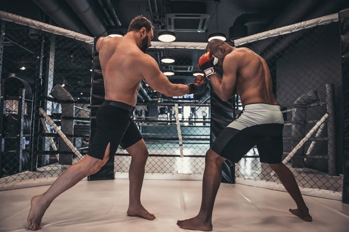 Two boxers in a ring.