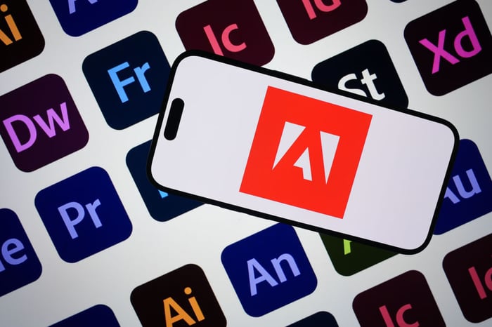 An Adobe logo on a smartphone screen.