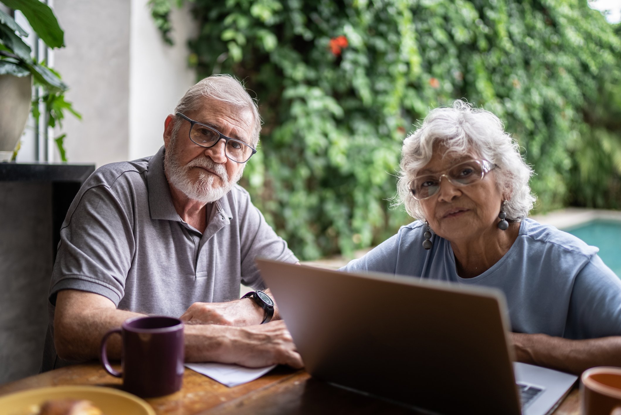 Senior couple laptop serious GettyImages-1397343629