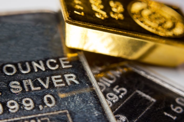 Silver and gold bars.