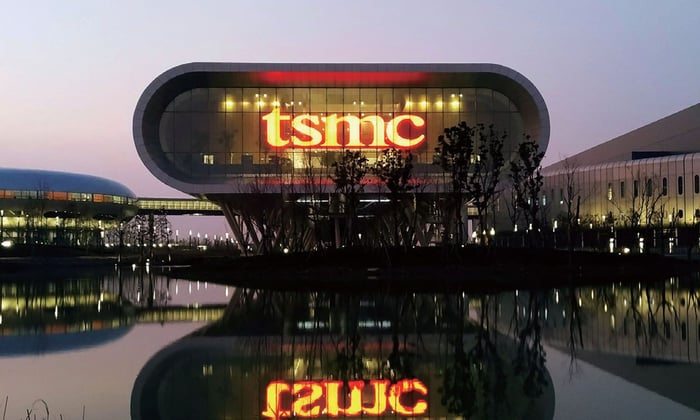 Taiwan Semiconductor Manufacturing TSMC office with the logo on the side of the building.