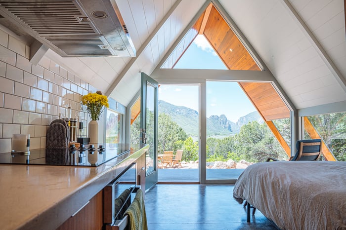 A home with a mountain view out the window.