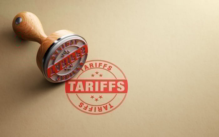 Red stamp reads TARIFFS.