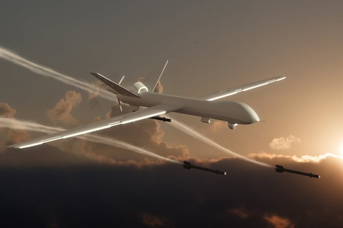 Military drone firing rockets.