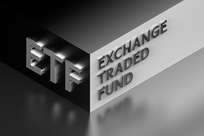 Metal block labeled ETF and exchange traded fund.