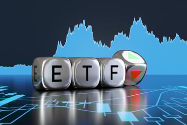 The letters “ETF” on dice surrounded by stock market charts.
