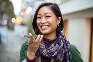 Woman Talk Smartphone City Wireless 5G 4G Data Voicemail Getty