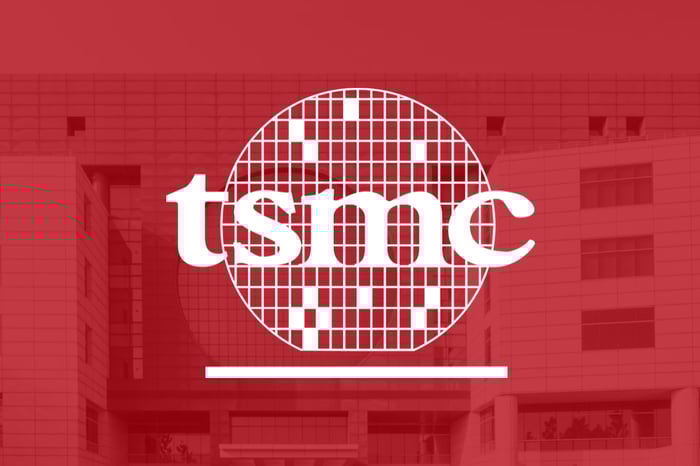 The "TSMC" laid on top of a red background.