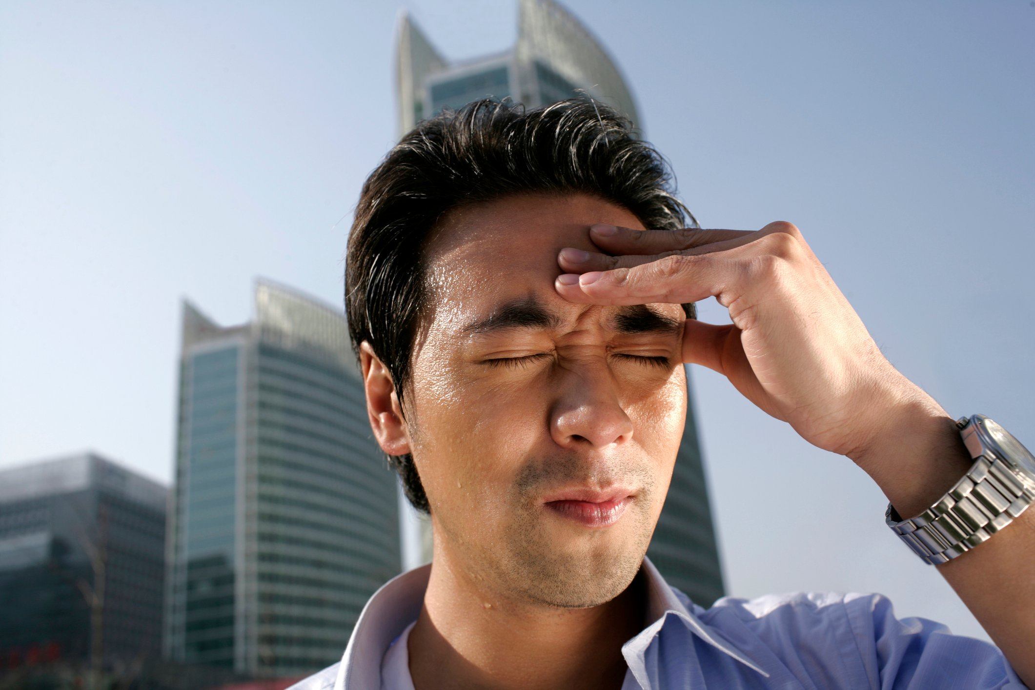 Getty - someone regretting hand on brow eyes closed unhappy hurting