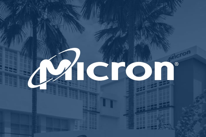 Micron logo with headquarters in background.