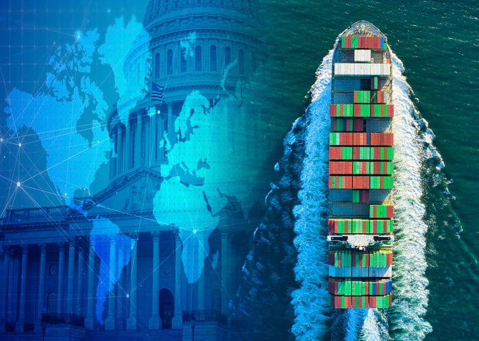 A ship with containers floats in the water, superimposed next to image of the Capitol and a world map.