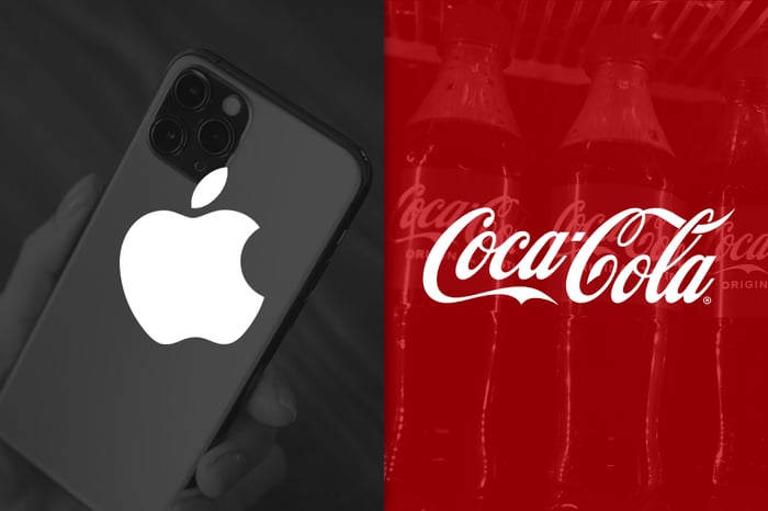 Hand holding phone with Apple logo, and bottles with the Coca-Cola logo superimposed.
