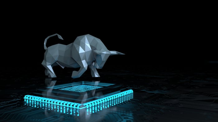 A three-dimensional figure of a bull on a semiconductor chip.