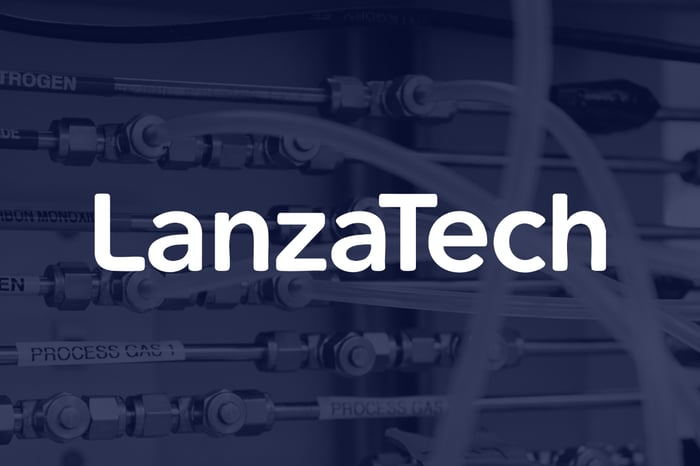 White LanzaTech logo set over dark picture of gas collection equipment. 