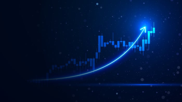 A bright blue line highlights the increase in a growth stock chart.