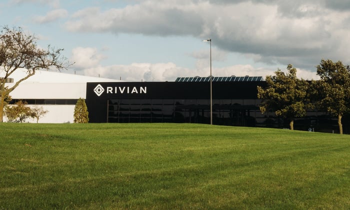 Rivian headquarters near a field.