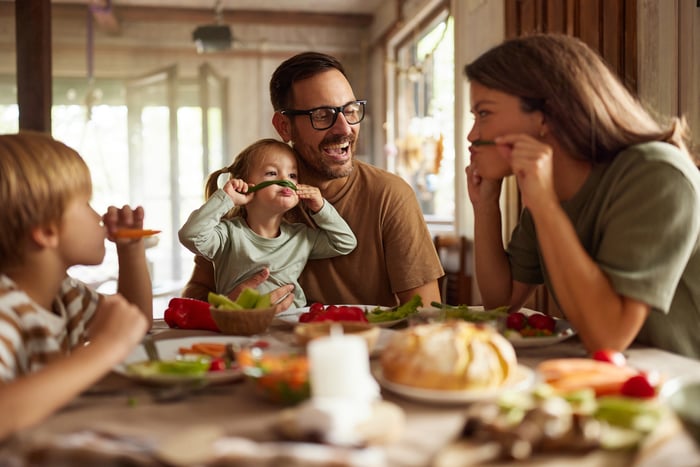 A family at the dinner table.