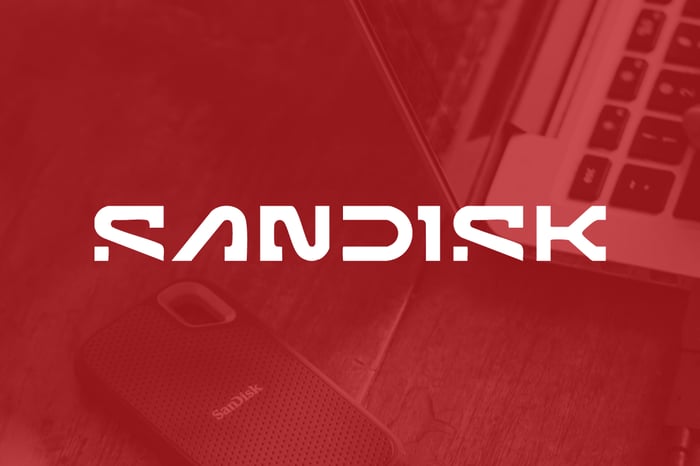 Sandisk company logo written on a red background.