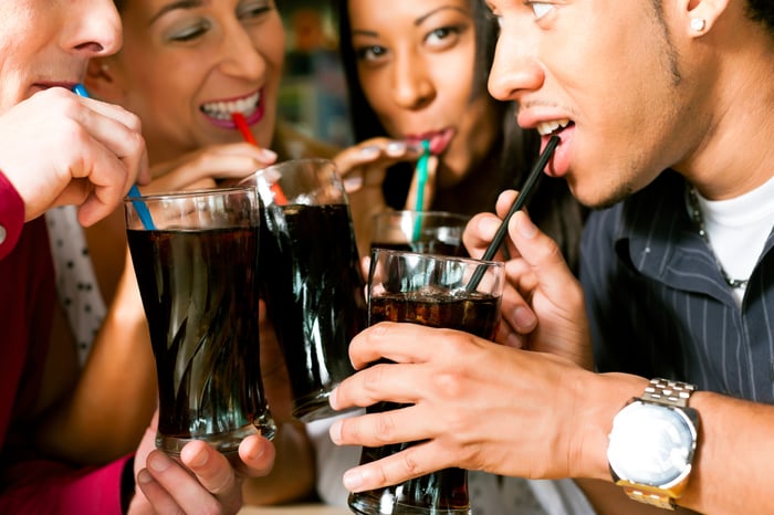 People drinking cola.