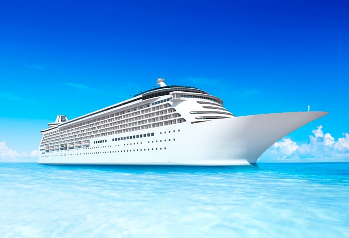 Cruise ship on a light blue sea.