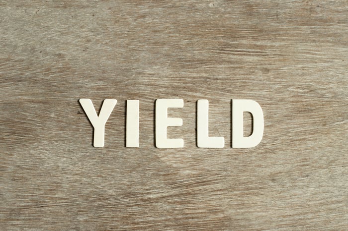 The word yield spelled out in paper letters.