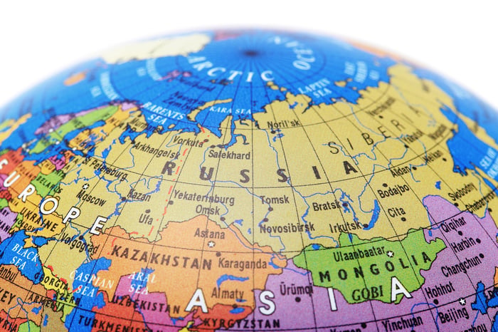 Colorful globe shows map of Russia.