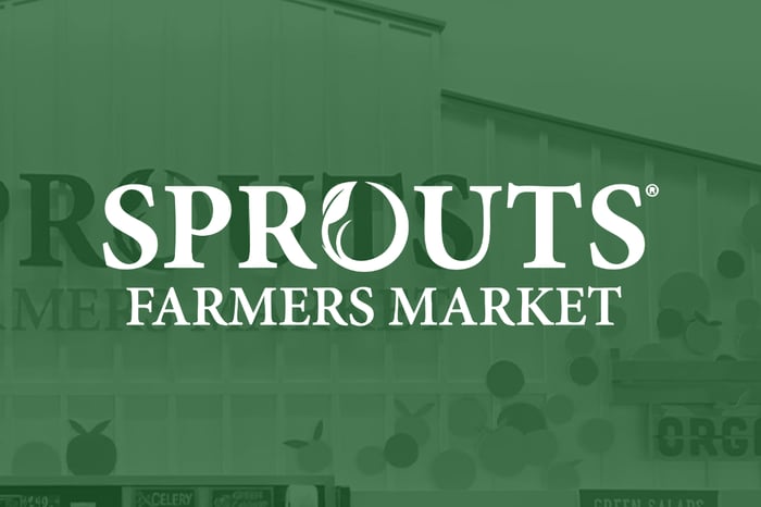 Sprouts Farmers Market's logo is superimposed on one of its grocery stores. 